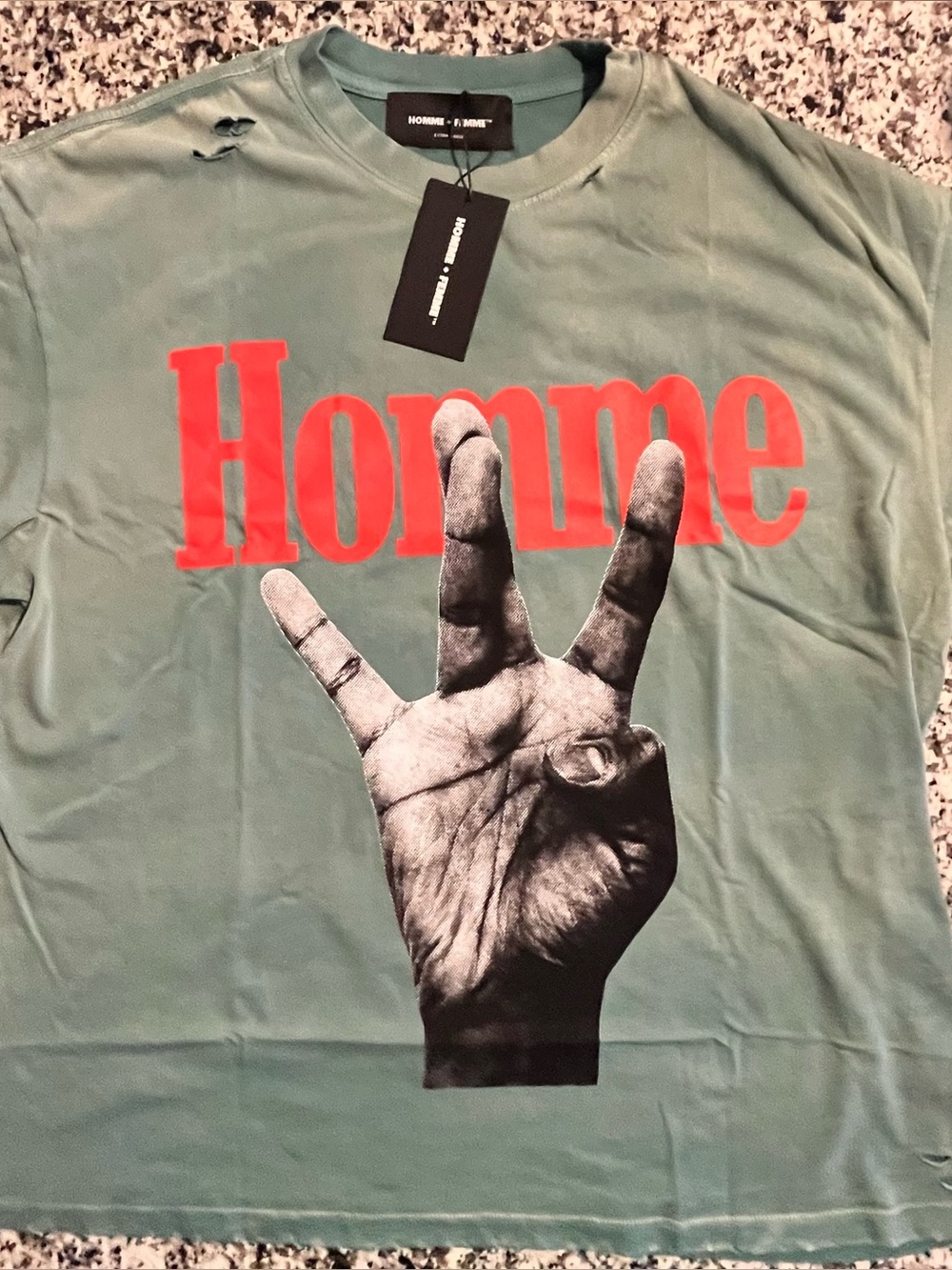 Homme Graphic Tee with twisted fingers